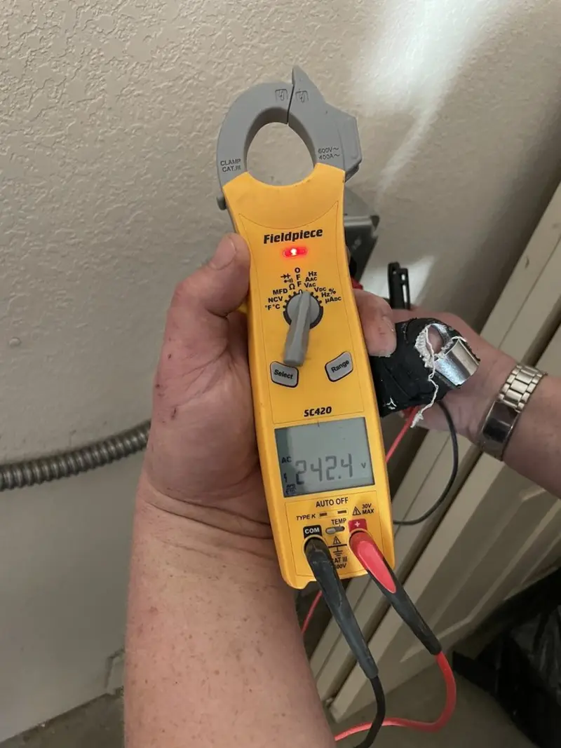 Voltage testing with clamp meter during Hot Tub / Pool Electrical Wiring in Fultondale